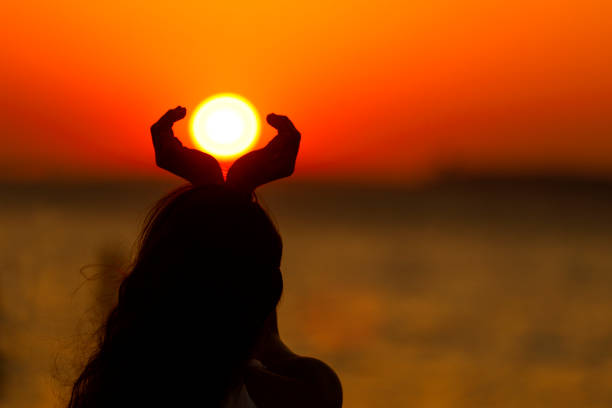 beautiful woman silhouette in backlight