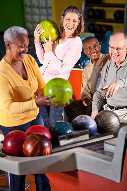 istock Seniors at bowling alley 170144573