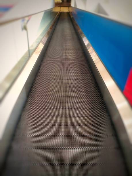 istock A special long descending escalator for troly carriers 1701489366