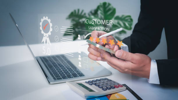istock Business people use computers and telephones to analyze customer service satisfaction. Customer Satisfaction Survey concept, service experience rating online application, satisfaction feedback review 1701530282