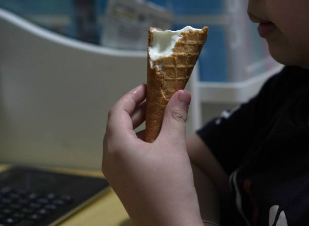 Mouth eat and hold icream ,close up