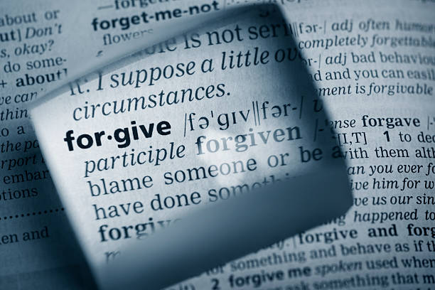 Definition "forgive" stock photo