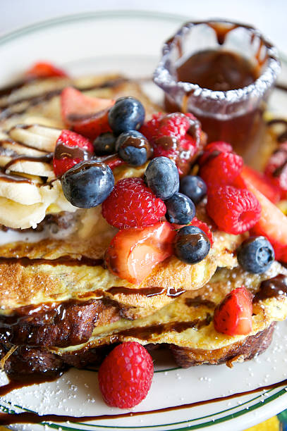 istock French Toast with Blueberries Raspberries Maple Syrup 170153928
