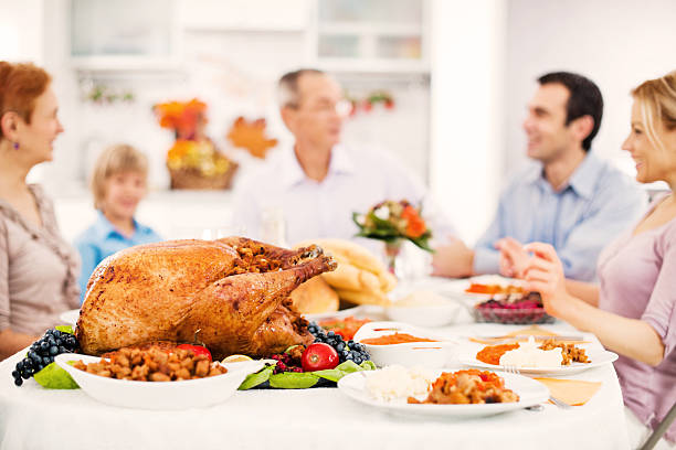 istock Family celebrating Thanksgiving day 170155496