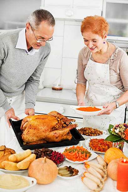 istock Romantic mature couple celebrating Thanksgiving day 170155555