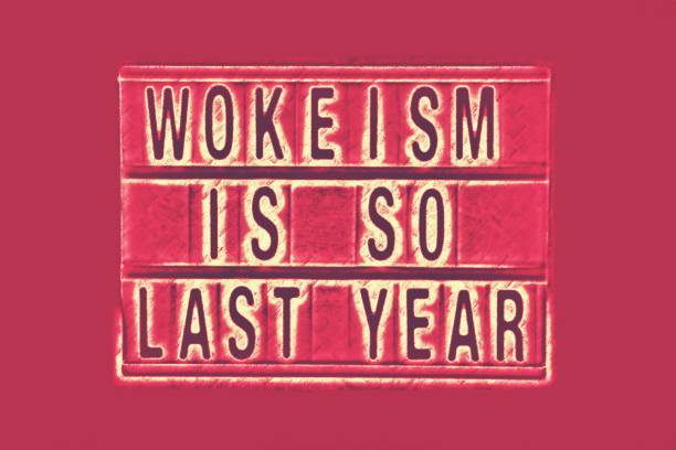 A chalkboard sign with the words 'Wokeism Is So Last Year' on it for a Cancel Culture concept. This is part of my Signs of the Times Collection for Social History.