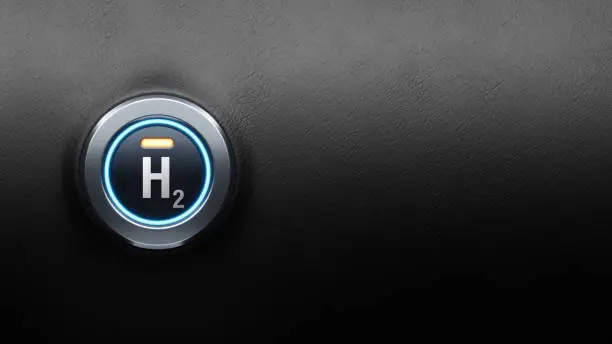 Photo of Start engine car button on black leather, start plan to carbon neutrality using hydrogen energy