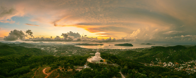 Aerial panoramic view of Phuket Big buddha on sunrise dawn.