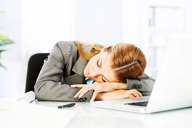 istock Business woman sleeping at work. 170164630