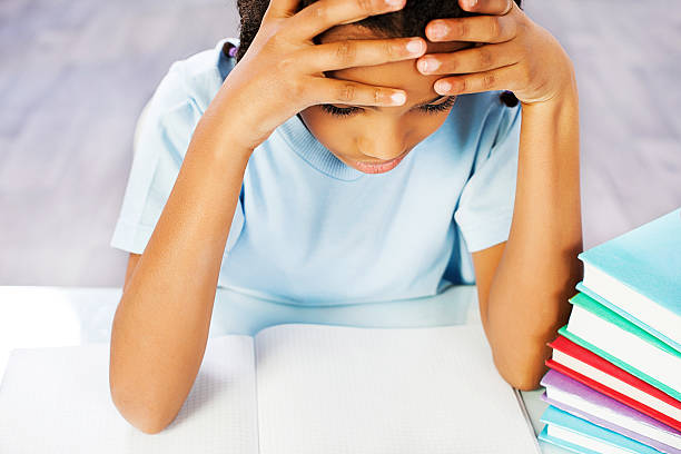 istock African American girl learning at the home. 170164823