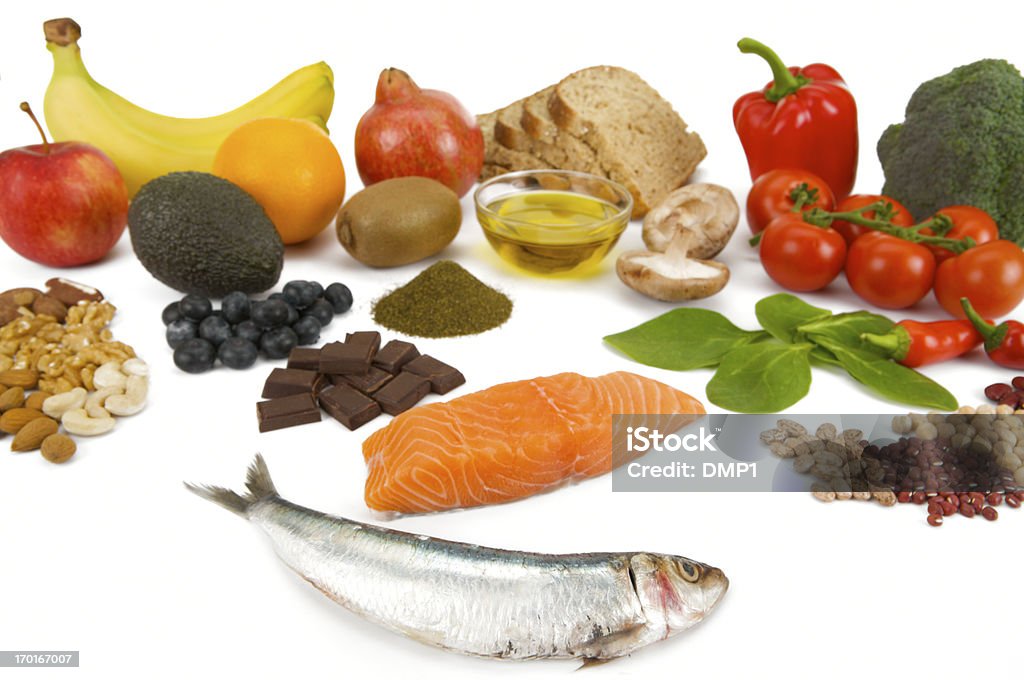 Gesunde frische Lebensmittel Gruppen bekannt als Superfoods auf weißem Hintergrund - Lizenzfrei Lachs - Meeresfrüchte Stock-Foto