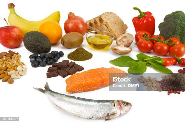 Gesunde Frische Lebensmittel Gruppen Bekannt Als Superfoods Auf Weißem Hintergrund Stockfoto und mehr Bilder von Lachs - Meeresfrüchte