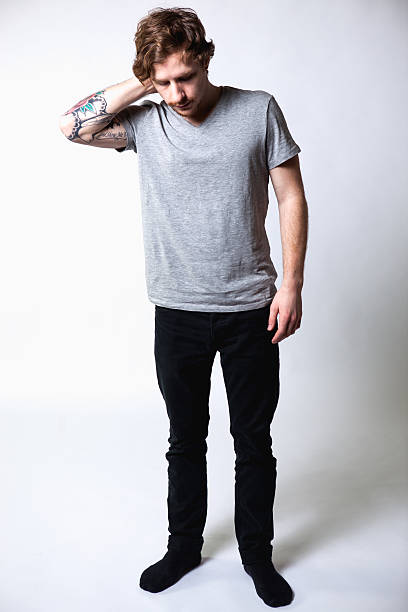 istock Young Attractive Caucasian Tattoo Hipster Man on White Background 170167325