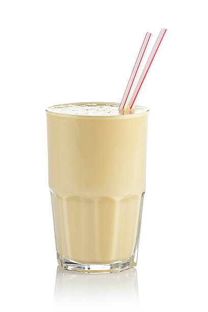 Vanilla Milk Shake Vanilla Smoothie on White Background. milkshake stock pictures, royalty-free photos & images