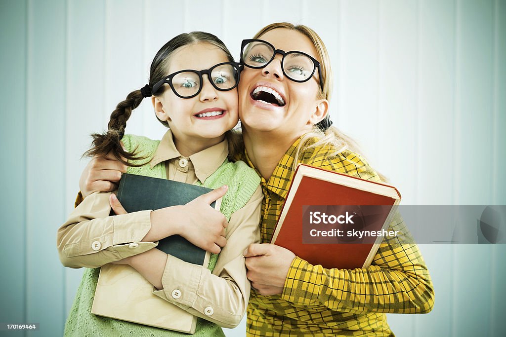 Adoptaram mãe e filha segurando livros. - Royalty-free Presunçoso Foto de stock