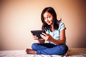 Little Girl With Digital Tablet