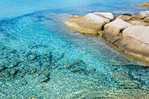 Spiaggia del Riso of Villasimius, a beach with granite rocks lapped by crystal turquoise water in south-east Sardinia