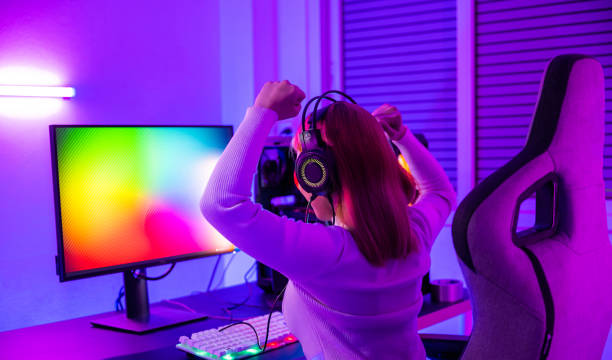 istock Asian gamer playing online video game excited on desktop computer 1701726248