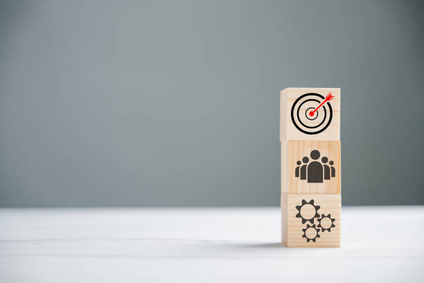 istock Wooden block cude step on table with Action Plan 1701727884