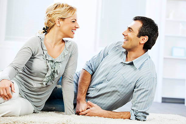 istock Laughing couple having fun at home 170173317