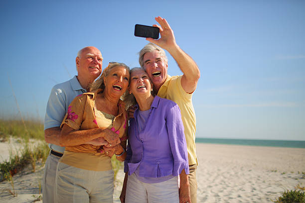 istock Happy Senior Group taking Self Portrait with Mobile Phone 170173907