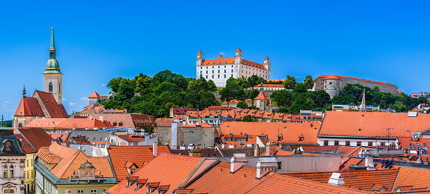 Bratislava, Slovakia - 11 June 2022: Panoramic rooftop view of Bratislava Castle, the cathedral and the old town