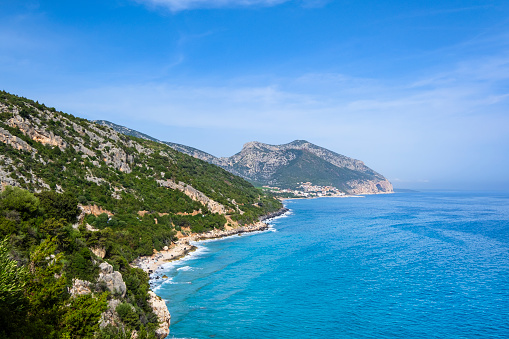 Coast of the Gulf of Orosei, with in background the town of Cala Gonone
