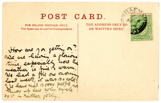 A handwritten holiday postcard sent from Braemar, Scotland, in 1906 - the writer is complaining about cold mornings but is happier now the weather is warmer. In fact, it is all really rather jolly! The postage stamp bears the portrait of King Edward VII.