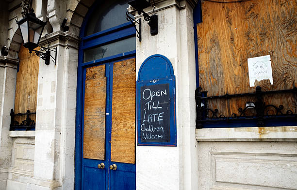 derelict pub - building exterior obsolete abandoned damaged foto e immagini stock