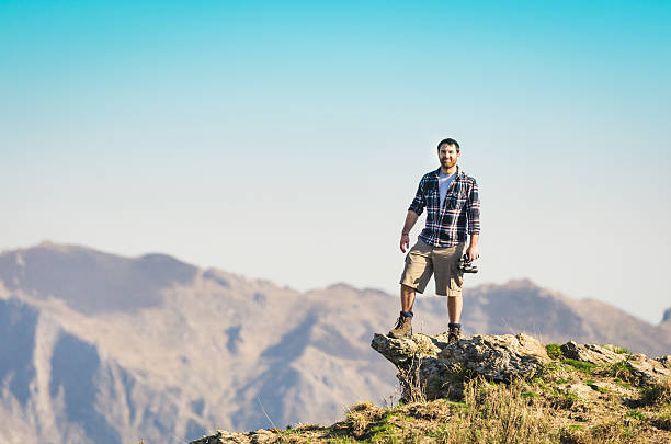 istock Man on top of the peak 170180868