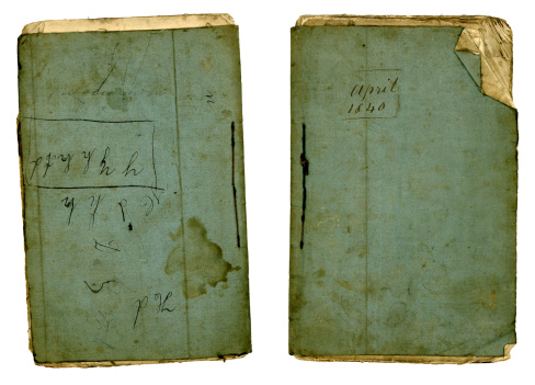 The front and back covers from an old sewn-together book dated April 1840. The pages are creased, folded and yellowed with age, and the cover is similarly discoloured as well as bearing evidence of some juvenile handwriting practice!