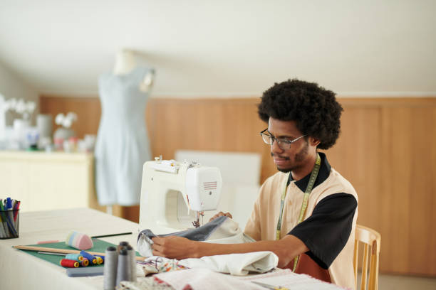 istock Tailor Working on Dress 1701813339