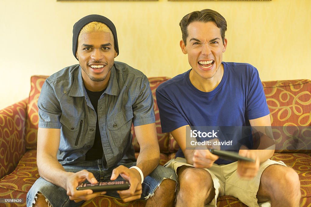 Jovens homens jogando jogos de computador - Foto de stock de Termo Esportivo royalty-free
