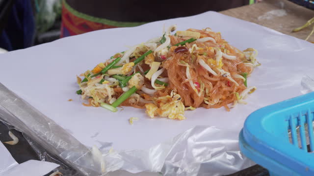 Pad Thai is a very popular street food and remains a signature dish that captures the heart of Thai culinary artistry.
