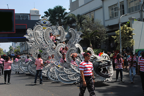Surabaya, Indonesia, 09-17-2023:\nThe anniversary of the Indonesian Navy is celebrated every September 10.\nOn Sunday, September 17, 2023, they held a carnival parade on Basuki Rahmat street, Surabaya, East Java, Indonesia.