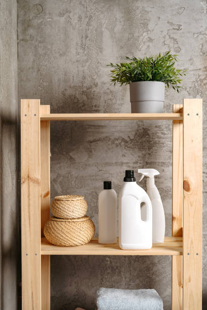 istock Wooden shelf with liquid detergents containers in a bathroom 1701828859