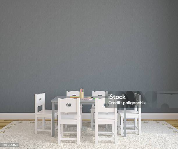 A Gray Table With Six White Chairs In A Playroom Stock Photo - Download Image Now - Playroom, Childhood, Domestic Room