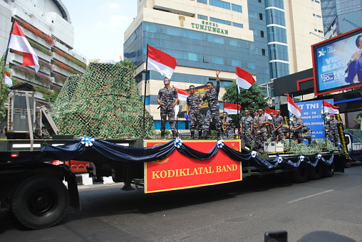 Surabaya, Indonesia, 09-17-2023:\nThe anniversary of the Indonesian Navy is celebrated every September 10.\nOn Sunday, September 17, 2023, they held a carnival parade on Basuki Rahmat street, Surabaya, East Java, Indonesia.