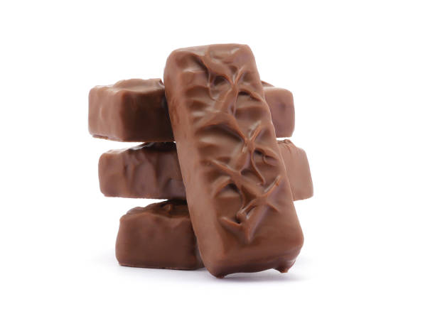 istock Chocolate bar isolated on white background. Delicious chocolate and caramel bar. 1701870044