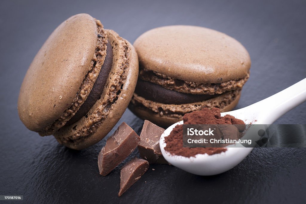 Macaroons with chocolate Macaroons with chocolate on a slate Art And Craft Stock Photo