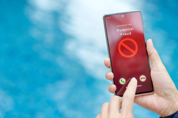 istock Financial fraud alert message on smartphone close up 1701870577