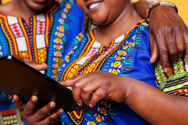 istock Woman hand tapping on digital tablet 1701871800