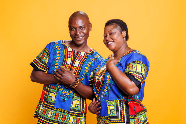 istock Smiling couple in love looking at camera 1701878484