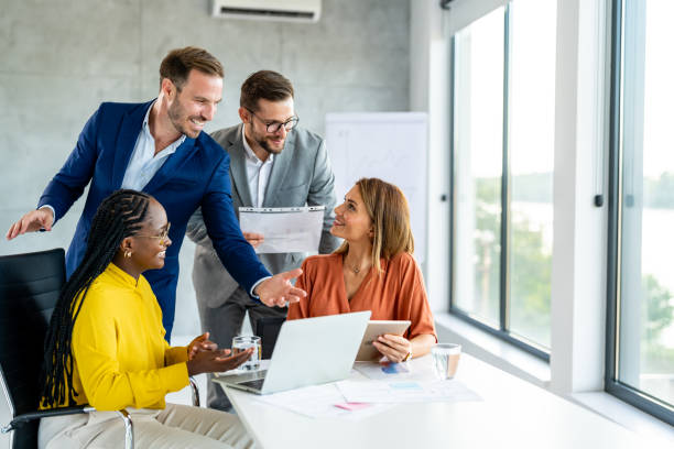 istock Diversity corporate people in collaboration for online project 1701879230