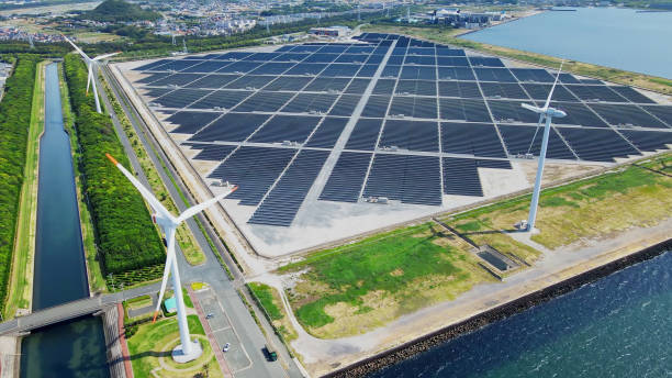 istock Solar power plant and Windmills aerial view. Renewable energy. Green tech. 1701879492