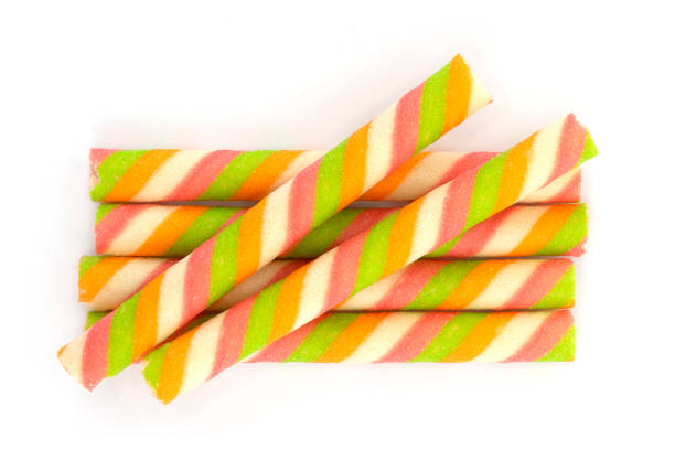 istock Wafer stick roll isolated on white background. colorful wafer stick rolls. 1701882494