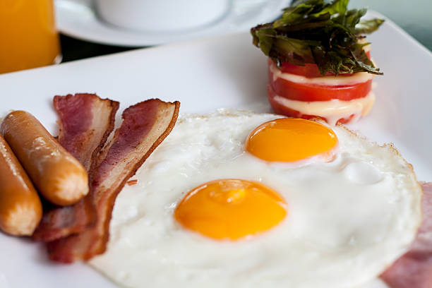 istock Fried Eggs with sausage, bacon, ham and tomato cheese (Breakfast) 170189571
