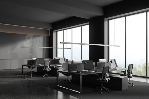 istock Grey business interior with coworking corner near panoramic window 1701898486