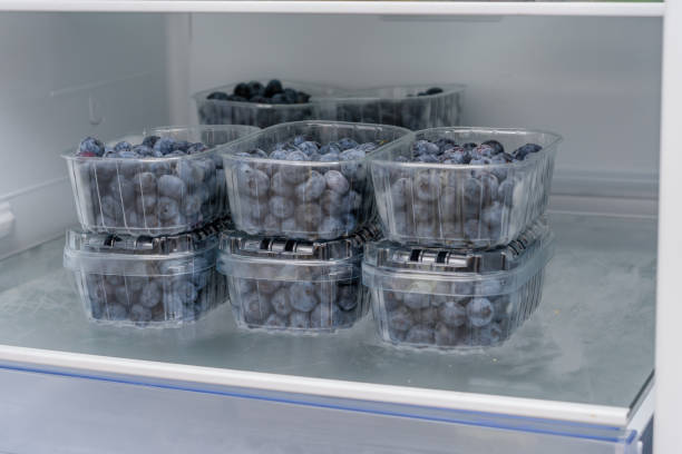 istock Berries in containers lying on a shelf in the refrigerator 1701907997