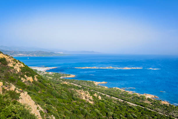 istock Rocky coastline in Capo Comino in eastern Sardinia - Italy 1701963741